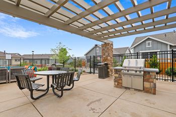 The patio at the enclave at woodbridge apartments in sugar land, tx